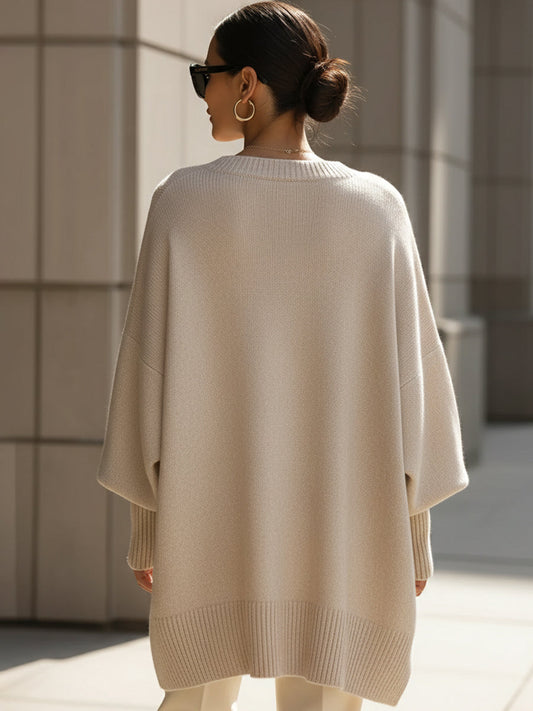 Pull oversize drapé beige vu de dos